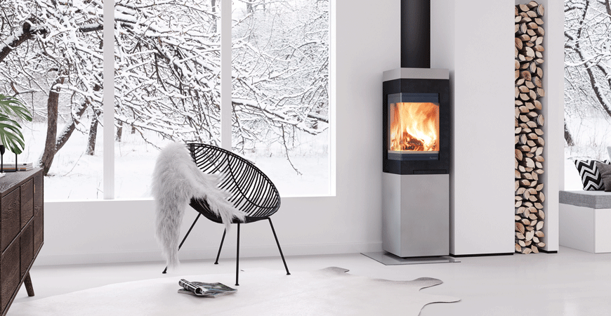 Nordpeis Quadro 2 Colorado Natural. Log burner in a conservatory.
