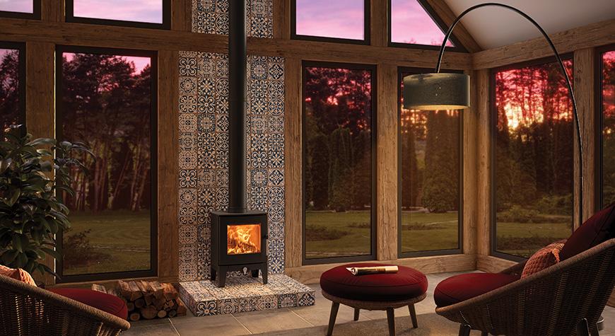 Log burner in a conservatory.