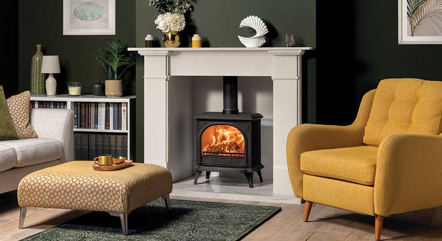 Stovax Huntingdon 30 multi-fuel Ecodesign stove, with Clear Door and door handle removed. Shown with Stovax Claremont mantel.