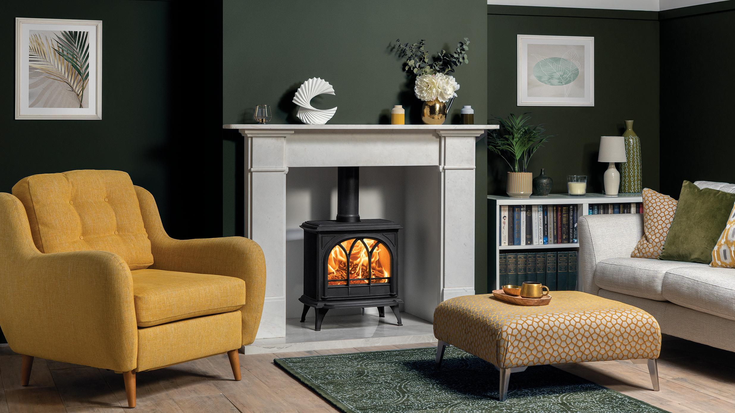 Stovax Huntingdon 30 multi fuel stove with tracery door. Shown with Claremont Mantel in Antique White Marble. Huntingdon Wood & Multi-Fuel Stoves