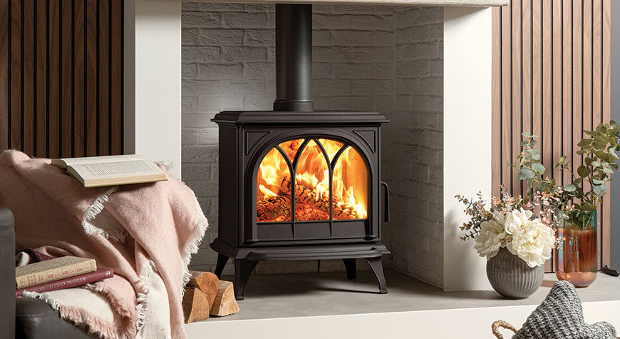 Stovax Huntingdon 30 wood burning Ecodesign stove, with Tracery Door, shown with ceramic wood effect beam