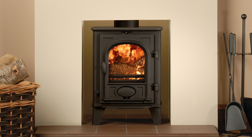 Stovax Stockton 3 stove in Matt Black, burning logs.